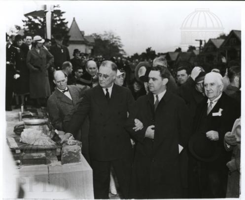 Franklin D. Roosevelt laying cornerstone for Poughkeepsie Post Office, John E. Mack on right, Mayor Spratt on left.