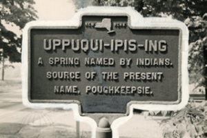 Black and white photo of historic marker that reads Uppuqi-ipis-ing