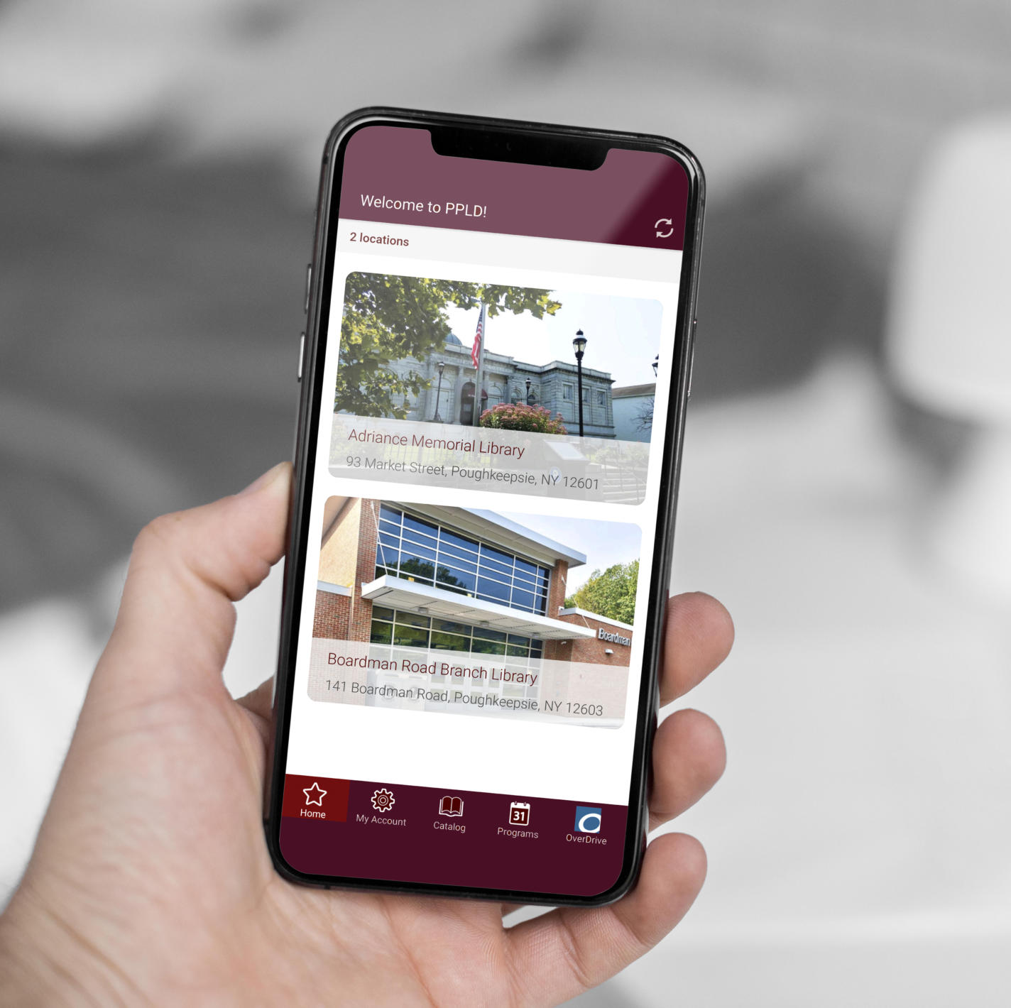 PPLDAppMockUp Photo of Library District App on Cellphone