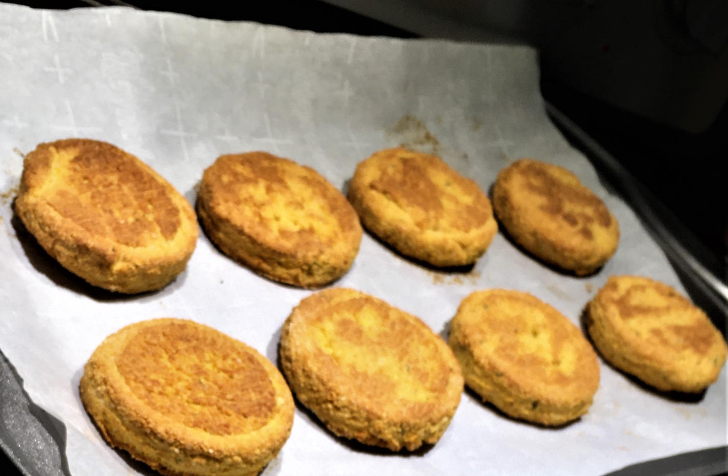 A tray of 8 pumpkin biscuits.
