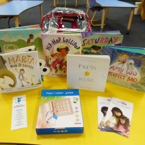 Contents of one of the library's Early Literacy Backpacks that can be borrowed.