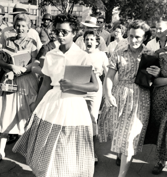 Elizabeth Eckford enduring racial slurs and being spit on while walking to Central High School; Little Rock, Arkansas, 1957