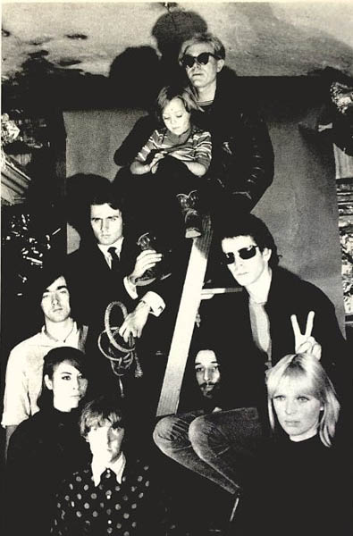 The Velvet Underground, Andy Warhol, Mary Woronov and Gerard Malanga at Silver Factory in 1966; photo by Billy Name